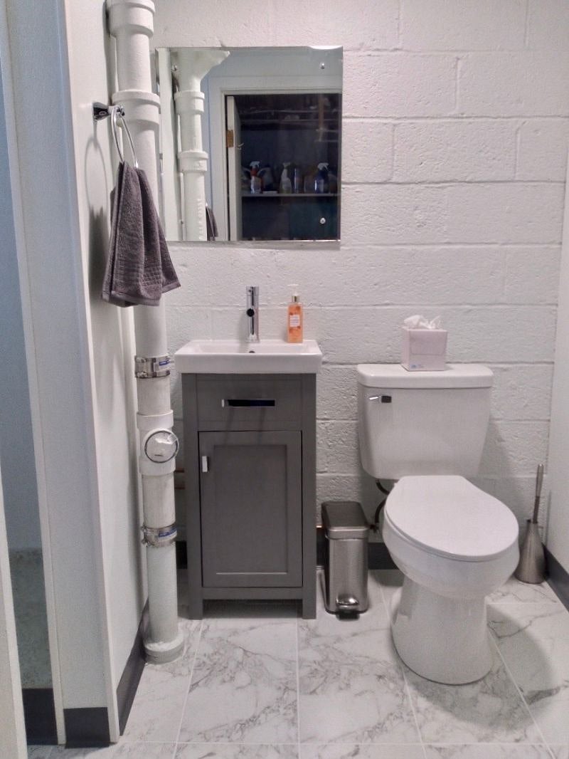 Updated Basement Bathroom with fresh linens and starter toiletries.