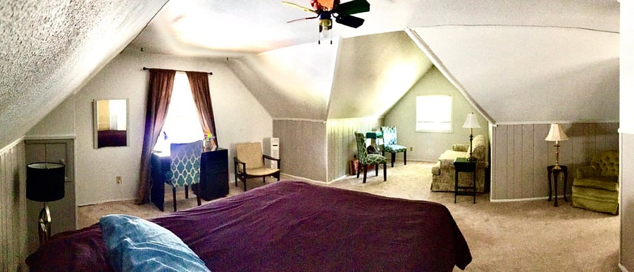Wide view of Second Floor Bedroom with Work & Listening Stations, Library and Lounge.