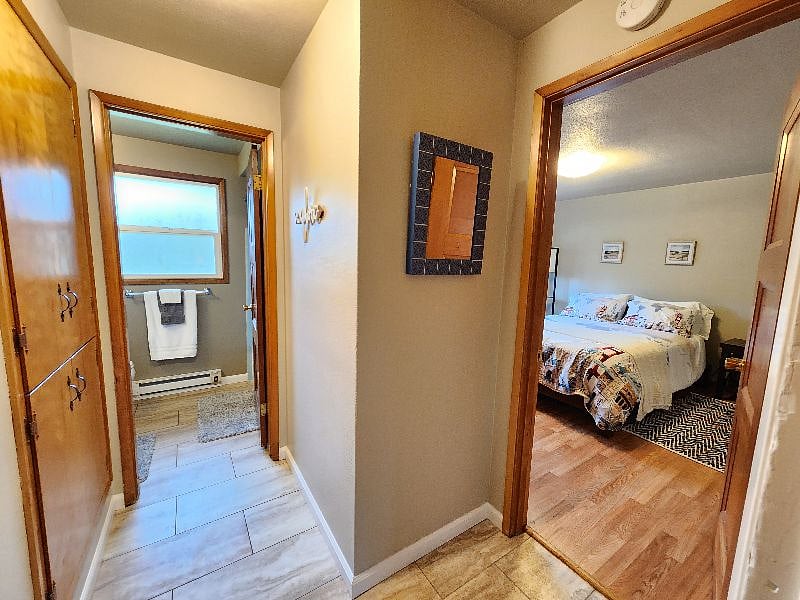 Hallway to bedroom and bathroom