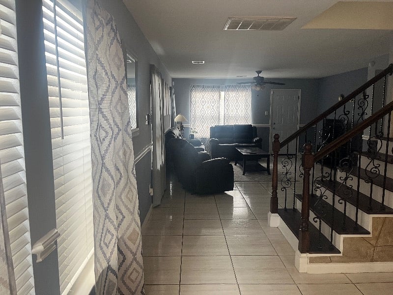 View walking into the house with the living room the first thing you see.