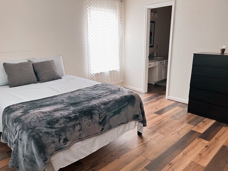 bed room number one. master bedroom with attached full bathroom and walk in closet.