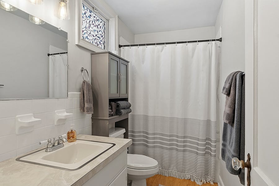 Your full size bathroom with tub and shower and plenty of storage.