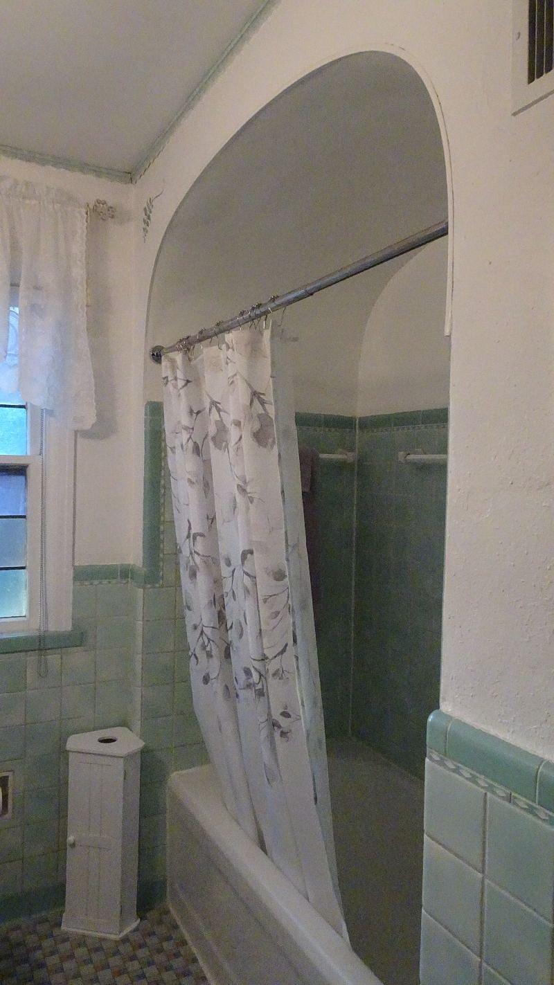 Full bath right next to bedroom.