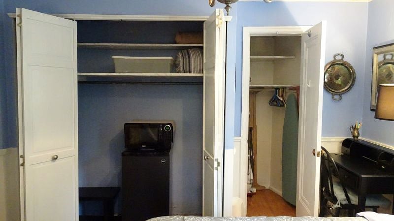 Refrigerator and microwave in the room. Deep freezer available for extra frozen food in basement. Fan, iron, ironing board also in room. Lots of storage space with 2 closets.