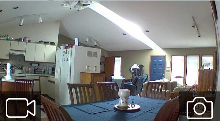 Dining rooom into kitchen and living room. Open concept.