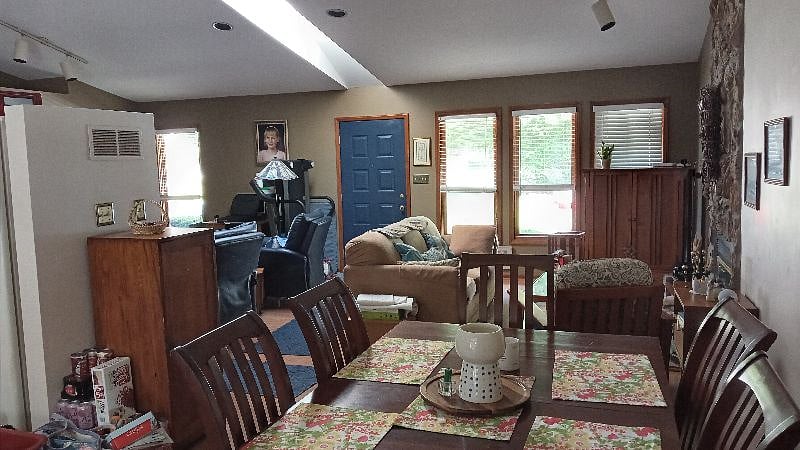 View straight across room. Fireplace to the right
