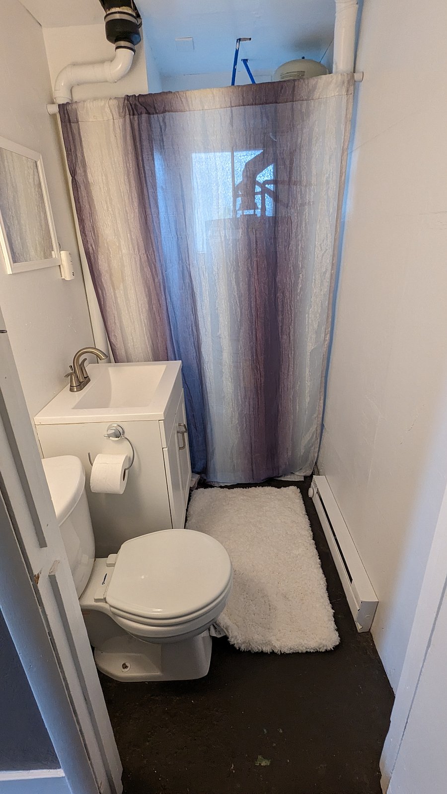 half bath located off of back bedroom