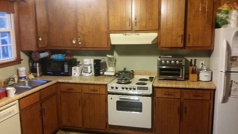 Kitchen also has washer and dryer in closet