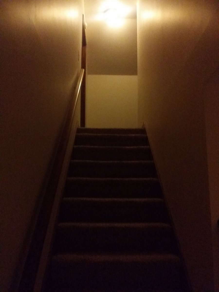 Stairway heading to the upstairs rooms