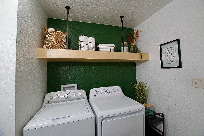 The in unit washer and dryer are located in the bathroom.