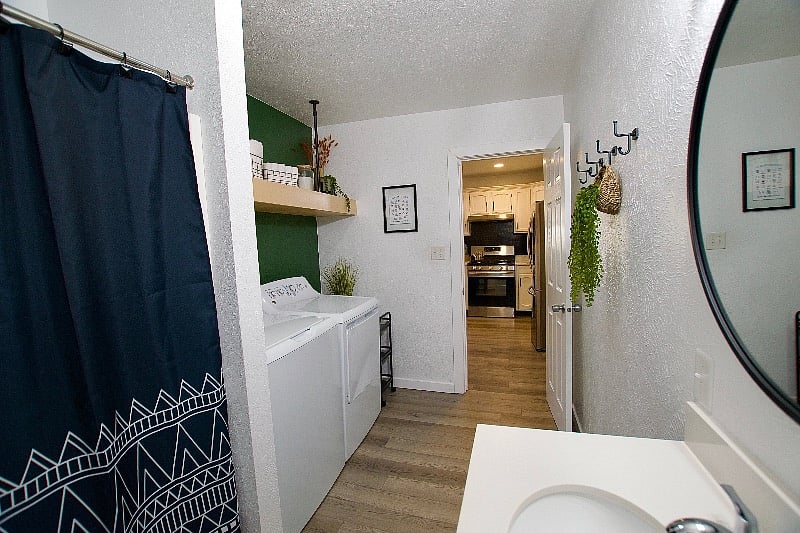 The bathroom contains a full tub/shower combo.