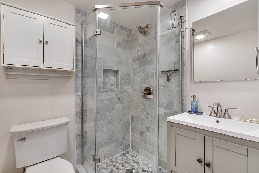 Beautiful bathroom includes a nice shower, medicine cabinet and cabinet above the toilet for your storage needs. Bath towels, hand towels and wash cloths are provided with your rental. 