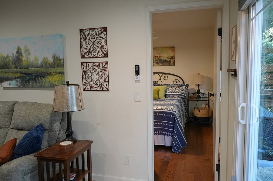 The view looking from the living room into the bedroom.