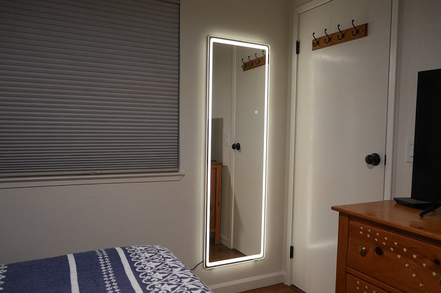 Full length LED lighted mirror. Hooks for your jackets, hats, bathrobe. 