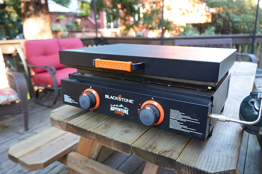 Tabletop Blackstone Griddle for outdoor cooking. Utensils and propane are provided. 
