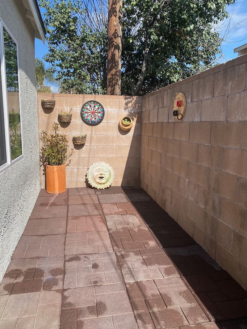 fenced-in outdoor area to the side of the property