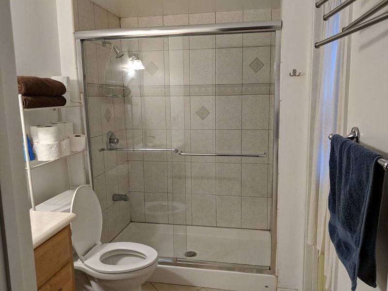 Master bathroom with direct access to back patio and pool.