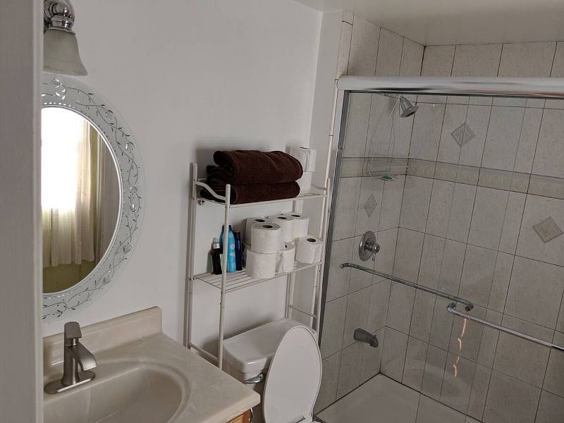 Master bathroom with direct access to back patio and pool.