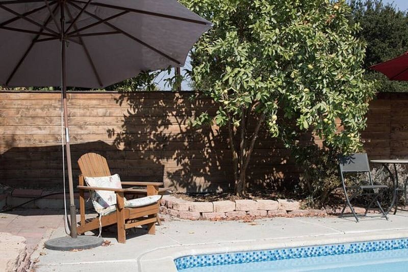 Plenty of places to relax out by the pool.