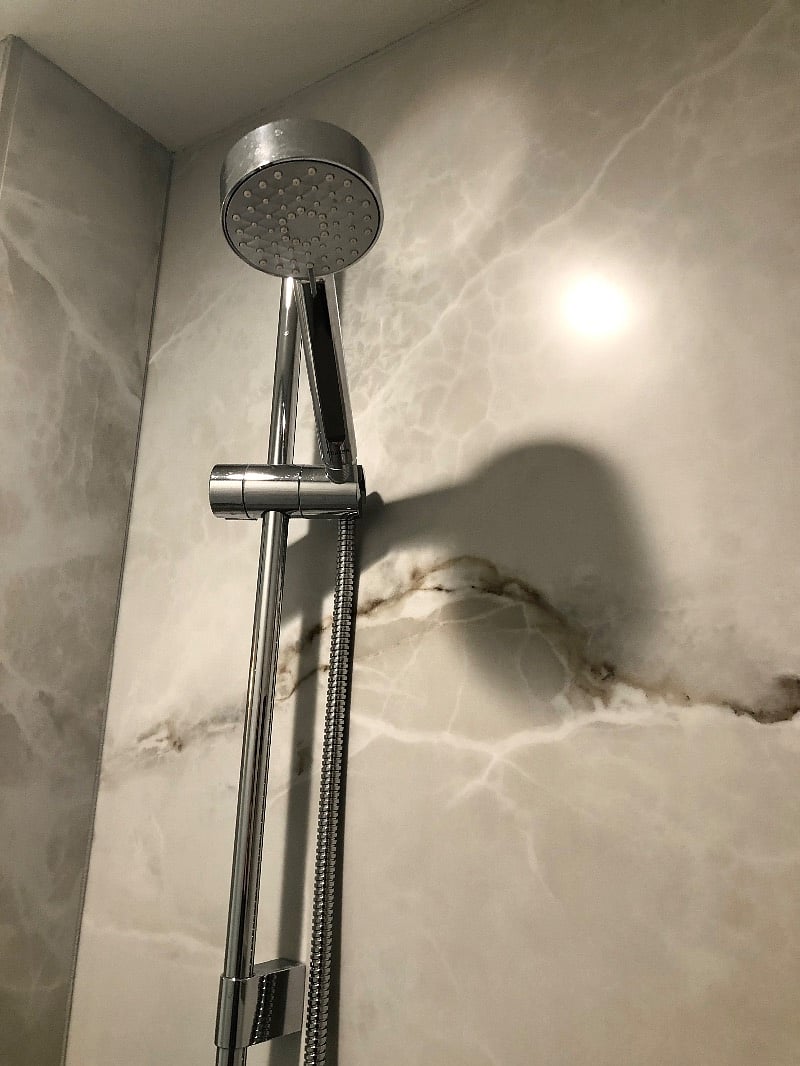 Height adjustable shower head