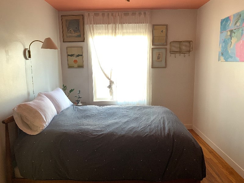 Full size bed with 400 thread count sheets and West Elm duvet.  Original artwork by Ryan Jacob Smith, Chris Duncan, and Eric Fisher.  