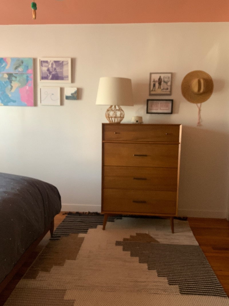 There are two of these tall dressers in the bedroom for extra storage.  I provide a sound machine for those who like white noise.  Original artwork by Ryan Berkeley and Ryan Jacob Smith. 