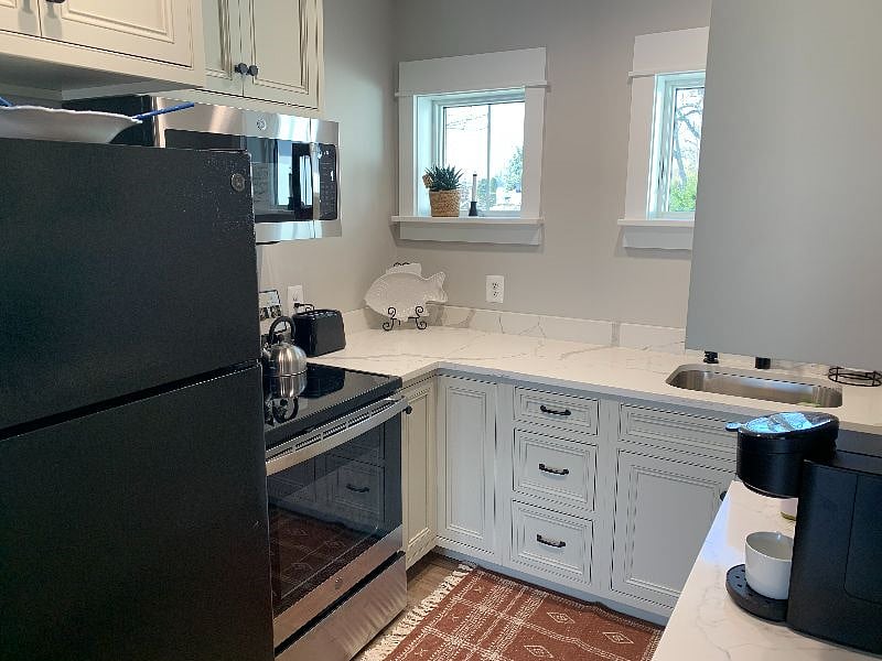 Full size refrigerator and stove, NO dishwasher