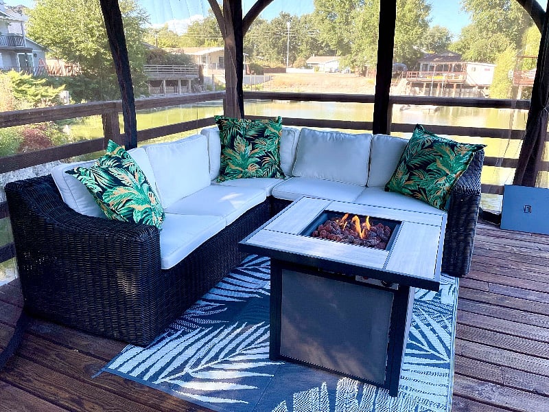 Outdoor shaded patio seating with gas fire pit