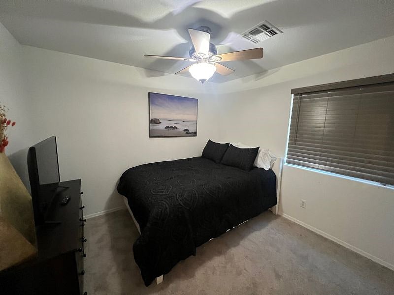Guest Queen bedroom #3 with large smart tv