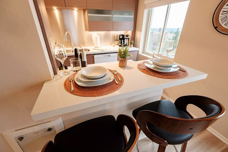 Breakfast Bar and coffee station with a fabulous view. Coffee maker prepares coffee in a 12-cup carafe and takes single serve coffee grounds or K-cup pods.