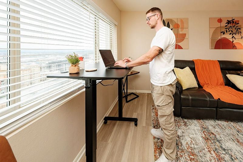 Standing Desk with push of a button adjustability. Your workstation with a fantastic view for working from home.