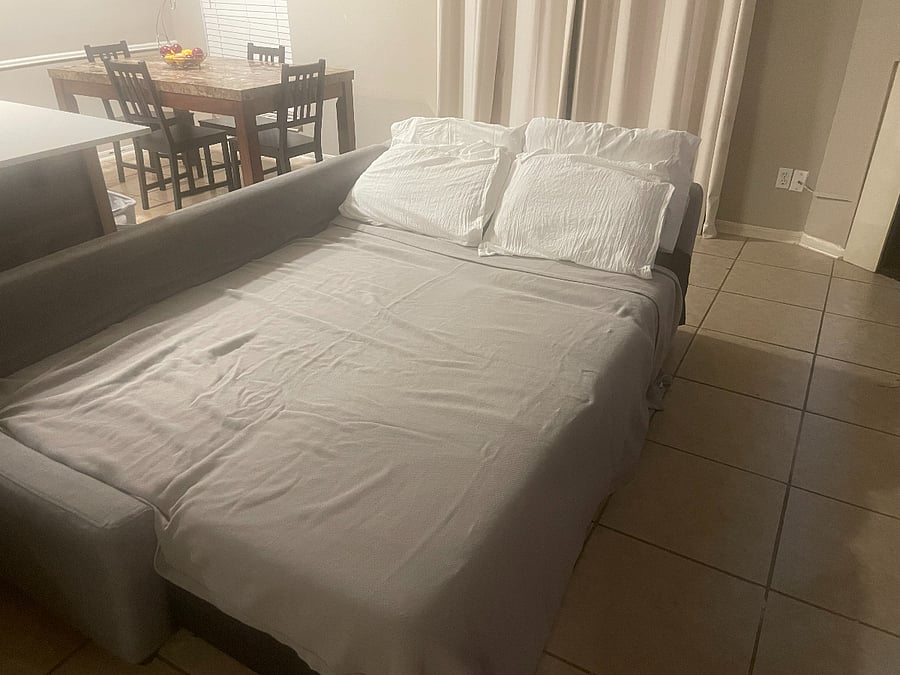 Couch converts to a queen sized sofa bed as needed.