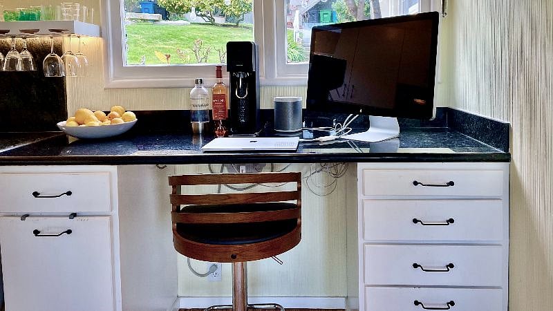 Workstation #1 is in the kitchen and enjoys courtyard views.