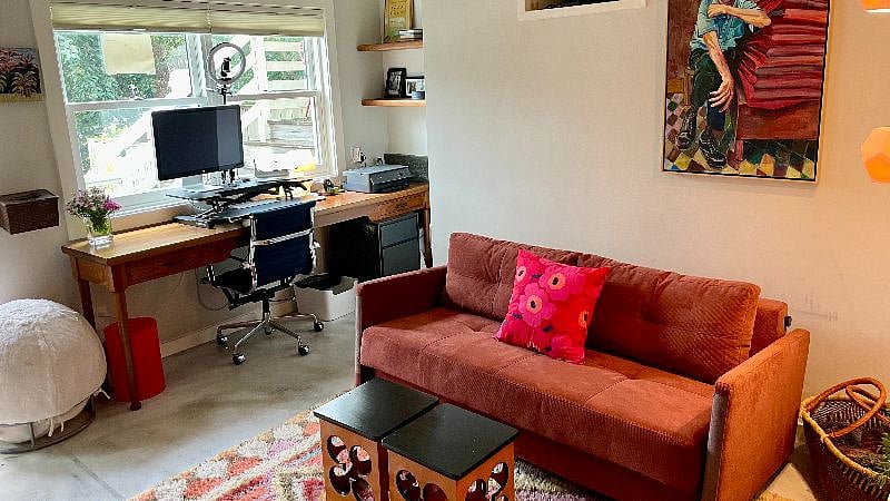 Bed can fold up into a couch. Polished concrete floors are heated with radiant heat.
