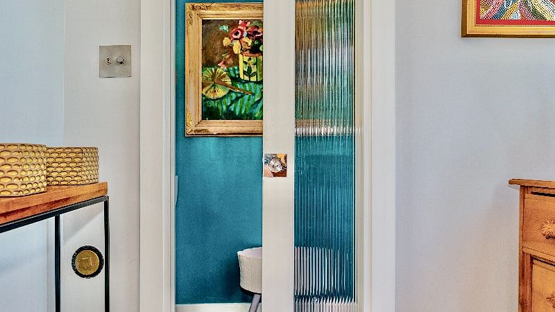 Off the bottom floor is a half bath.