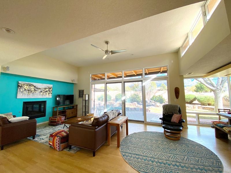 Living room with floor to ceiling windows for views and sunlight