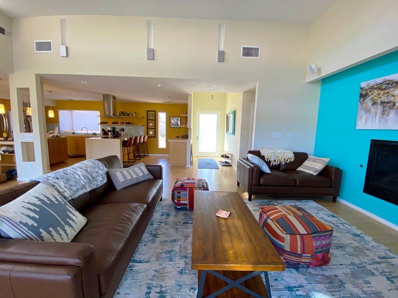 Living room, bar and front entry