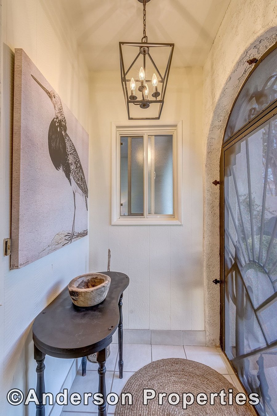 Foyer with window to master bedroom allowing option for fresh air on cool evenings 