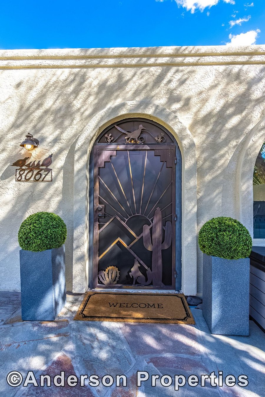 Gated door to foyer that can be locked and left open for fresh air and abundant light