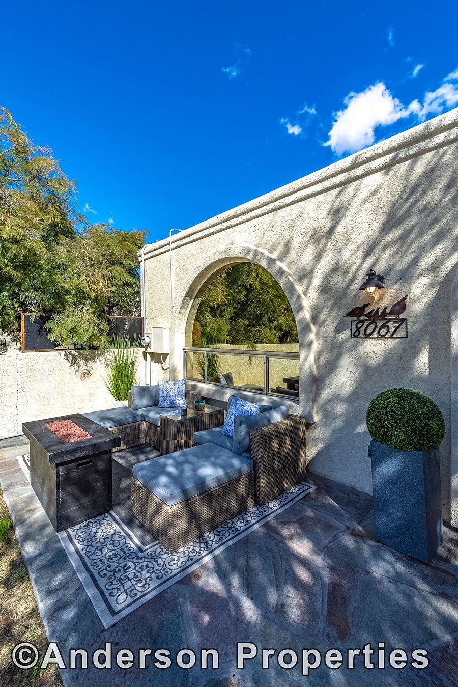Comfortable outdoor seating with fireplace