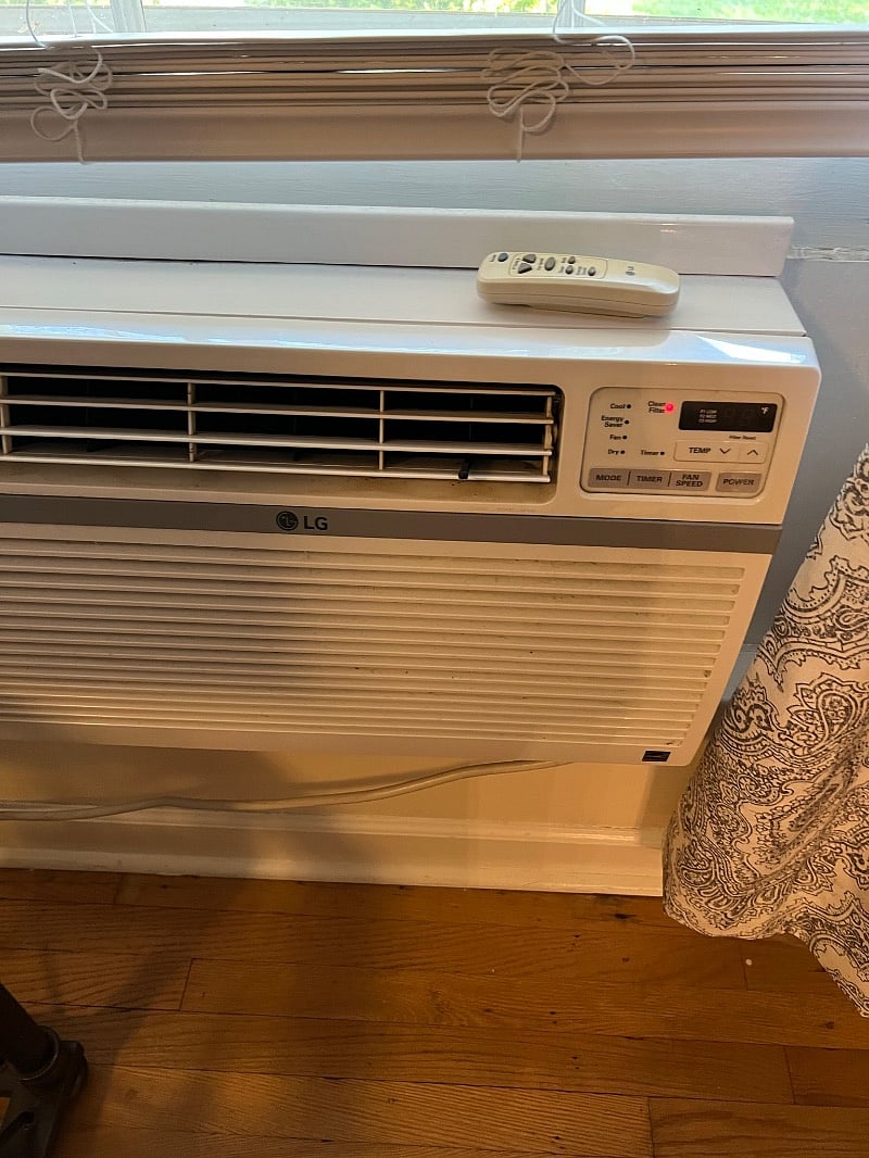 window units are located in bedroom and living room for cooling.