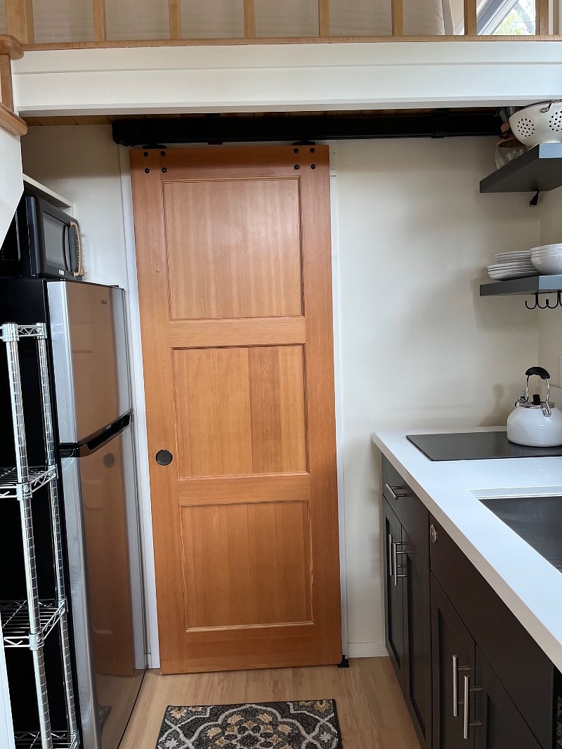 Barn door to bathroom.