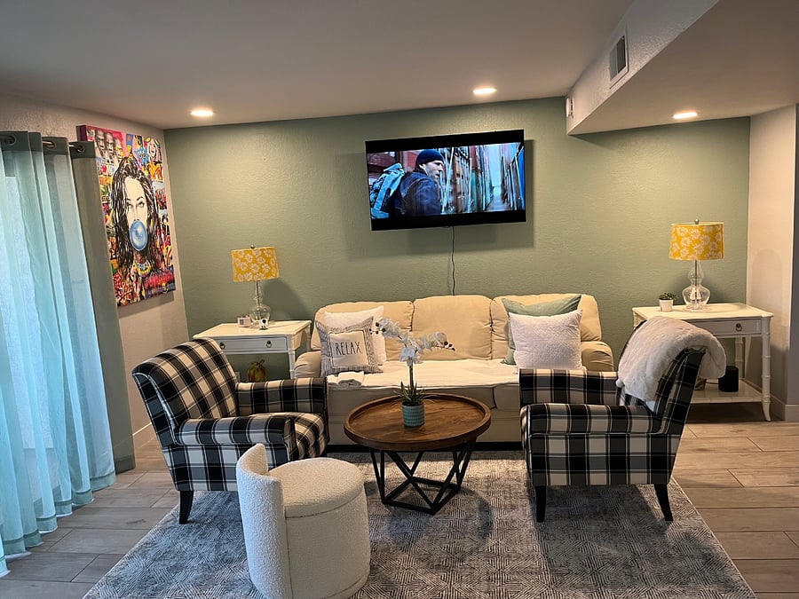 Enjoy a movie or your favorite sports channel on a 55-inch OLED flat screen smart TV.