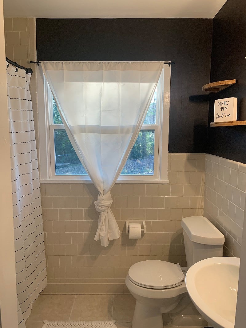Full bathroom located in the hallway