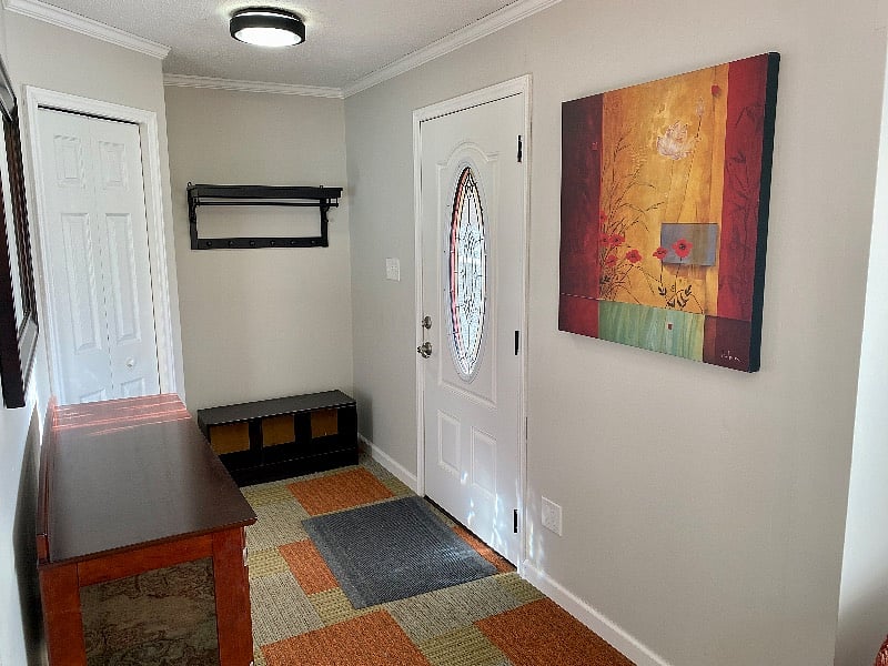 Separate entry with hall tree and closet