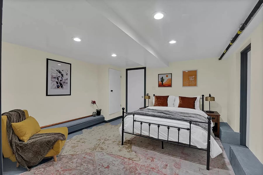 This comfortable bedroom offers a plush queen bed perfect for a restful nights sleep. The calming atmosphere makes it the ideal place to unwind after a busy day.