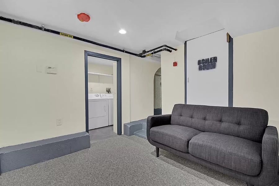 This laundry area is equipped with a washer and dryer, making it easy to keep up with laundry during your stay. With plenty of room for sorting and folding, its designed for convenience and efficiency.