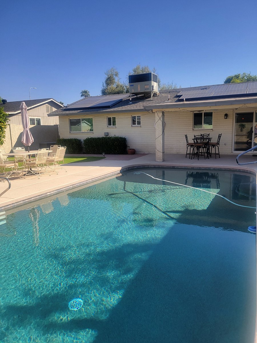 View from the pool to the back of the house.
