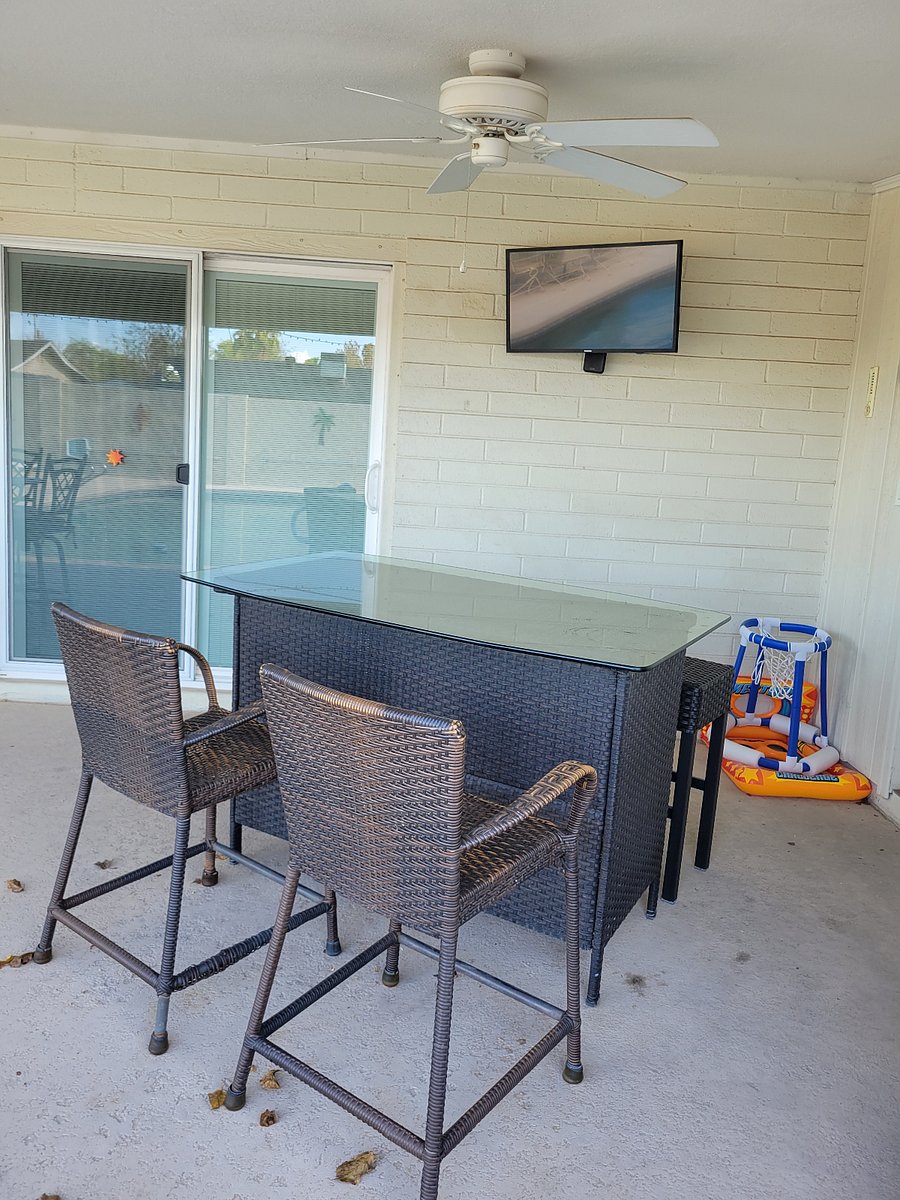 Bar area to sit at while watching tv outside.