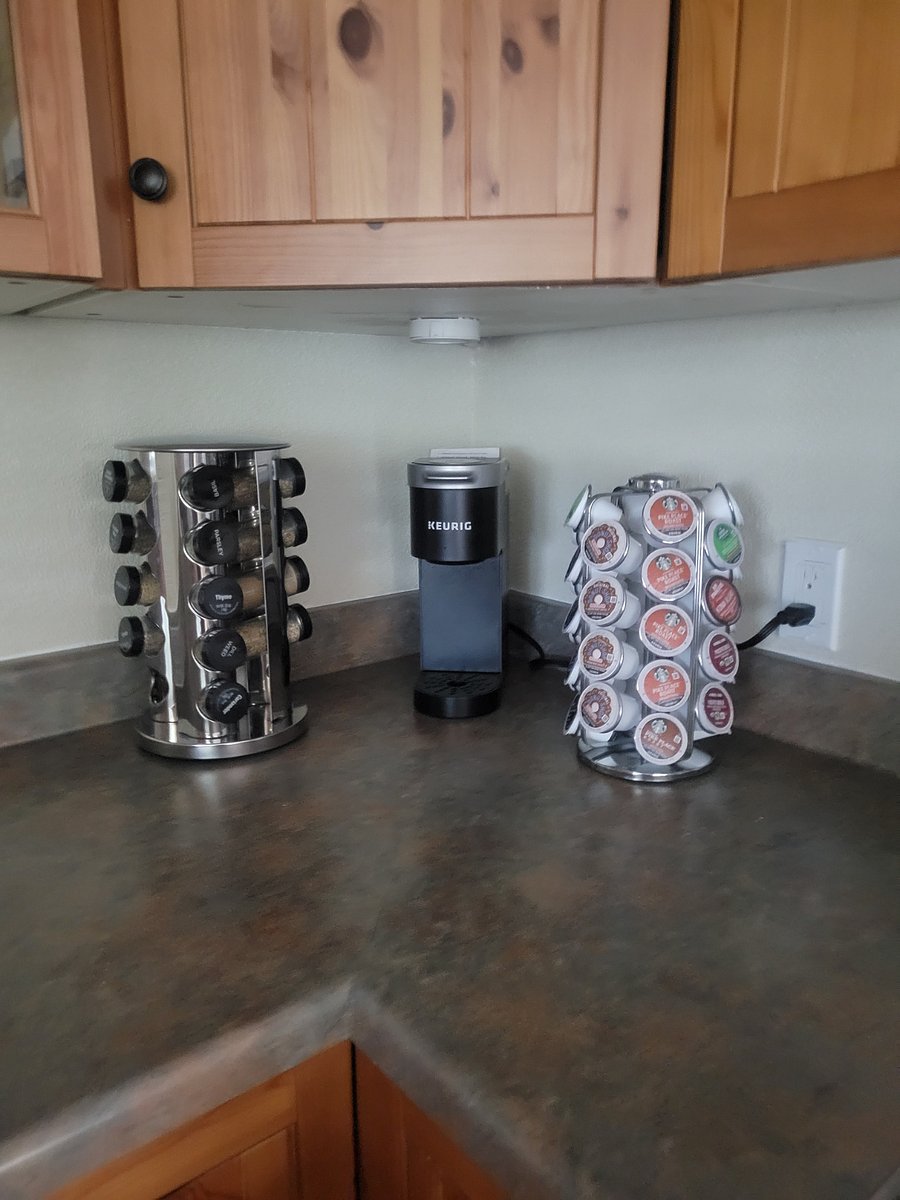 A Keurig coffee maker and some K-cups are provided.